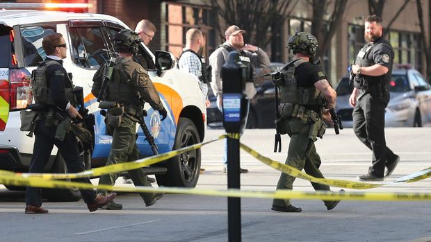 Police said at least five people were killed and eight were injured in a shooting at a bank in Louisville