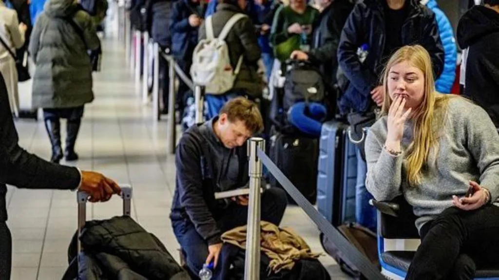 Six dead and hundreds of flights cancelled as snow causes chaos across ...