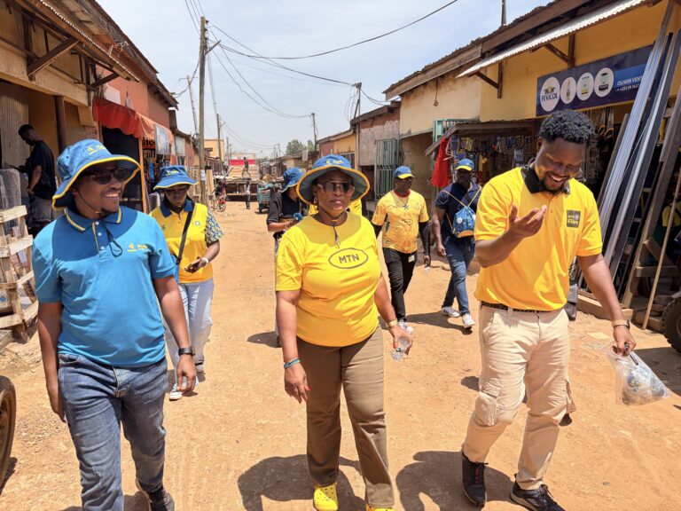 Jemima Kotei Walsh (middle), Chief Customer Experience Officer tours Ashaiman Market to engage with customers for their feedback (1)